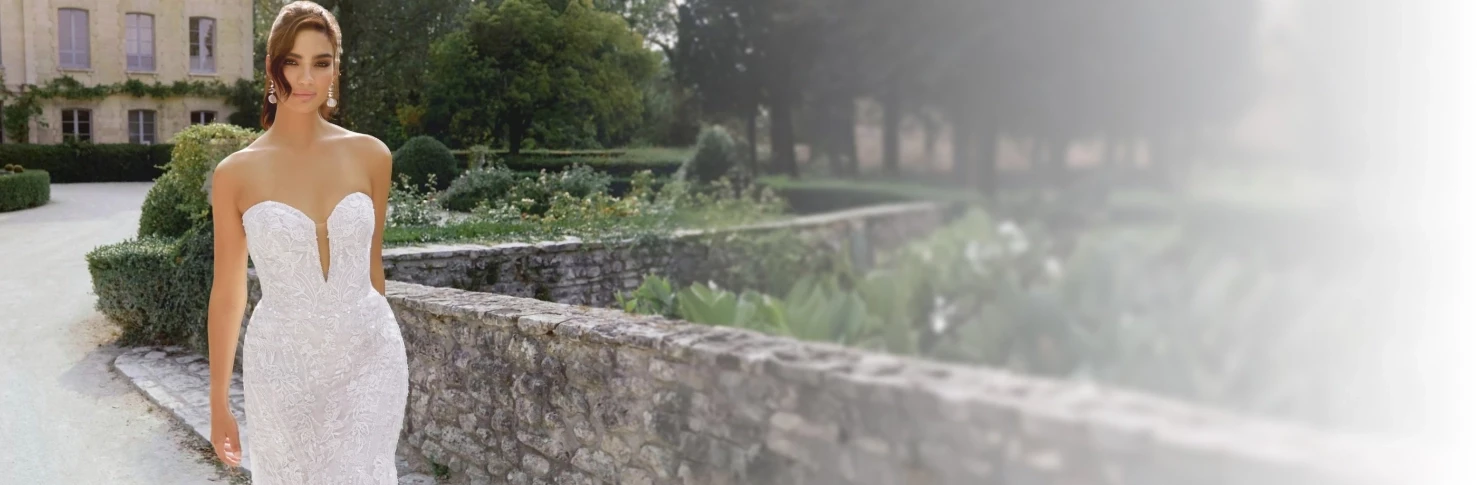 Model wearing a white gown